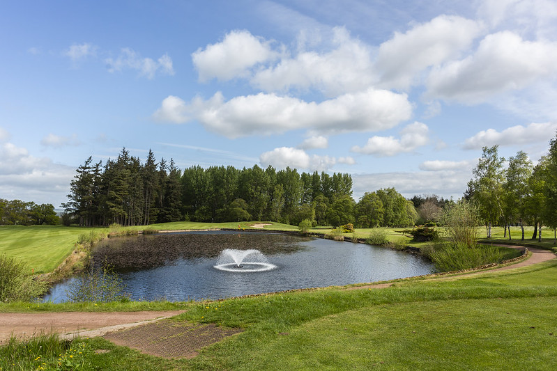 An Otterbine aerating fountain in the middle of a lake.