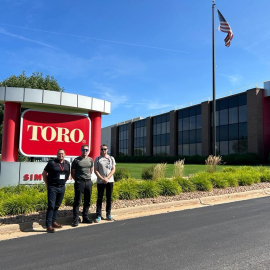 From right: 2022 award winner James Gaskell, with his endorser James Crowley and Alastair Rowell from Reesink at Toro Manufacturing.