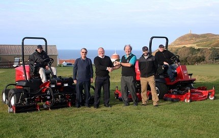 Jim Duncan, left of centre, from IOM Farmers shakes hands with Fred Gray Rowany GC. Also in the photo from left: Simon Miller, head greenkeeper, Mike Kewley, Rowany GC, Mike Atherton, IOM Farmers and Scott Howarth, greenkeeper.