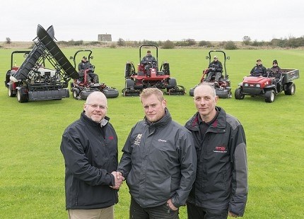 Head greenkeeperGlenn Rayfield, centre, with Lely’s Julian Copping, left, and Andy Branton of TNS Group.