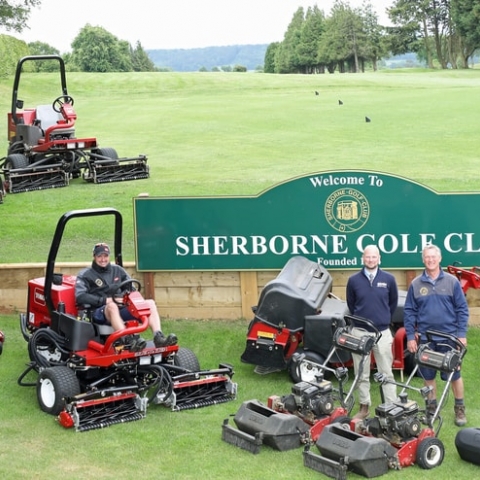 Chris Watson, Sherborne Golf Club course manager, standing right, with Elliot Wellman from Devon Garden Machinery, standing left, with the club’s new Toro machinery.