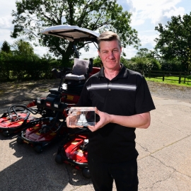 Graham Hall, managing director at Redtech Machinery with the award for service.