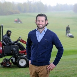 Course manager John Mcloughlin on the course at Warrington Golf Club with some of the new Toro riding and pedestrian greens mowers.