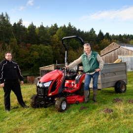 Reesink's Steven Haynes, left, with Learning Field's Douglas Chalmers, and the TYM T194.