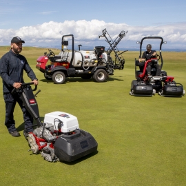 Darren operating the Greensmaster eFlex 1021, with the Multi Pro 5800-D and the Greensmaster eTriFlex 3370 in the background.